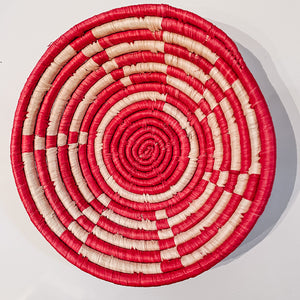 JustOne's red and tan designed basket, handwoven in Uganda