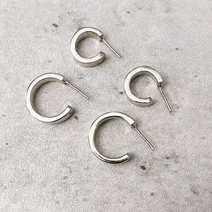 JustOne's silver small hoops that hug your ear, handcrafted in Kenya