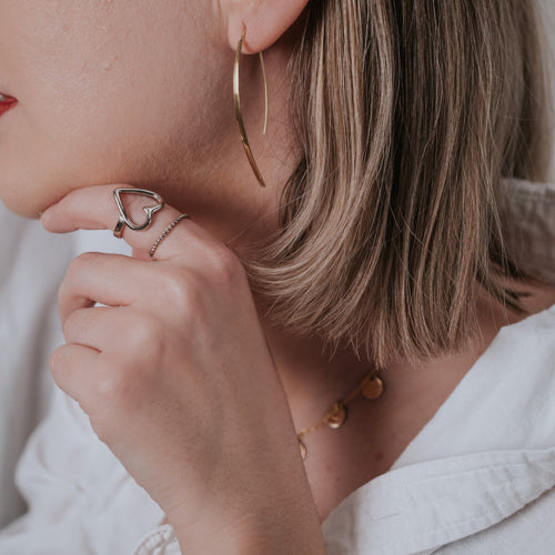 JustOne's silver adjustable ring with heart, handcrafted in Kenya