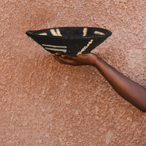 JustOne's black hanging basket with white decals handwoven in Uganda