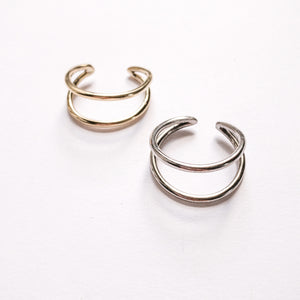 JustOne's brass and silver adjustable rings with two bands to seem like two rings, handcrafted in Kenya