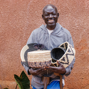 JustOne's deep basket with black and white designs handwoven in Uganda