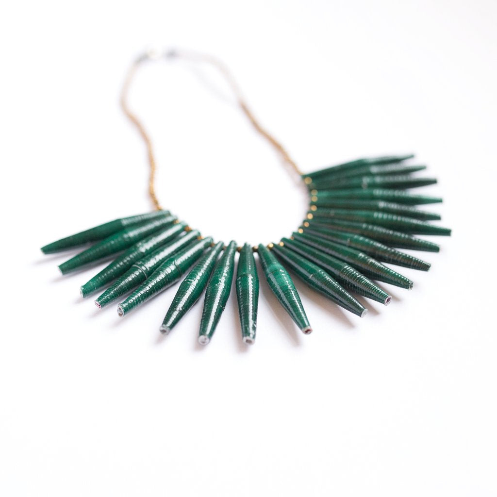JustOne's necklace with long green paper beads dangling off, handcrafted in Uganda