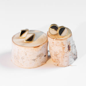 JustOne's black and White circle studs with a brass outline ethically made from recycled materials in Kenya