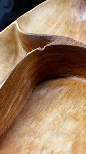 JustOne's oval wooden bowl with pieces of wood in the middle to create three sections, handmade in Kenya