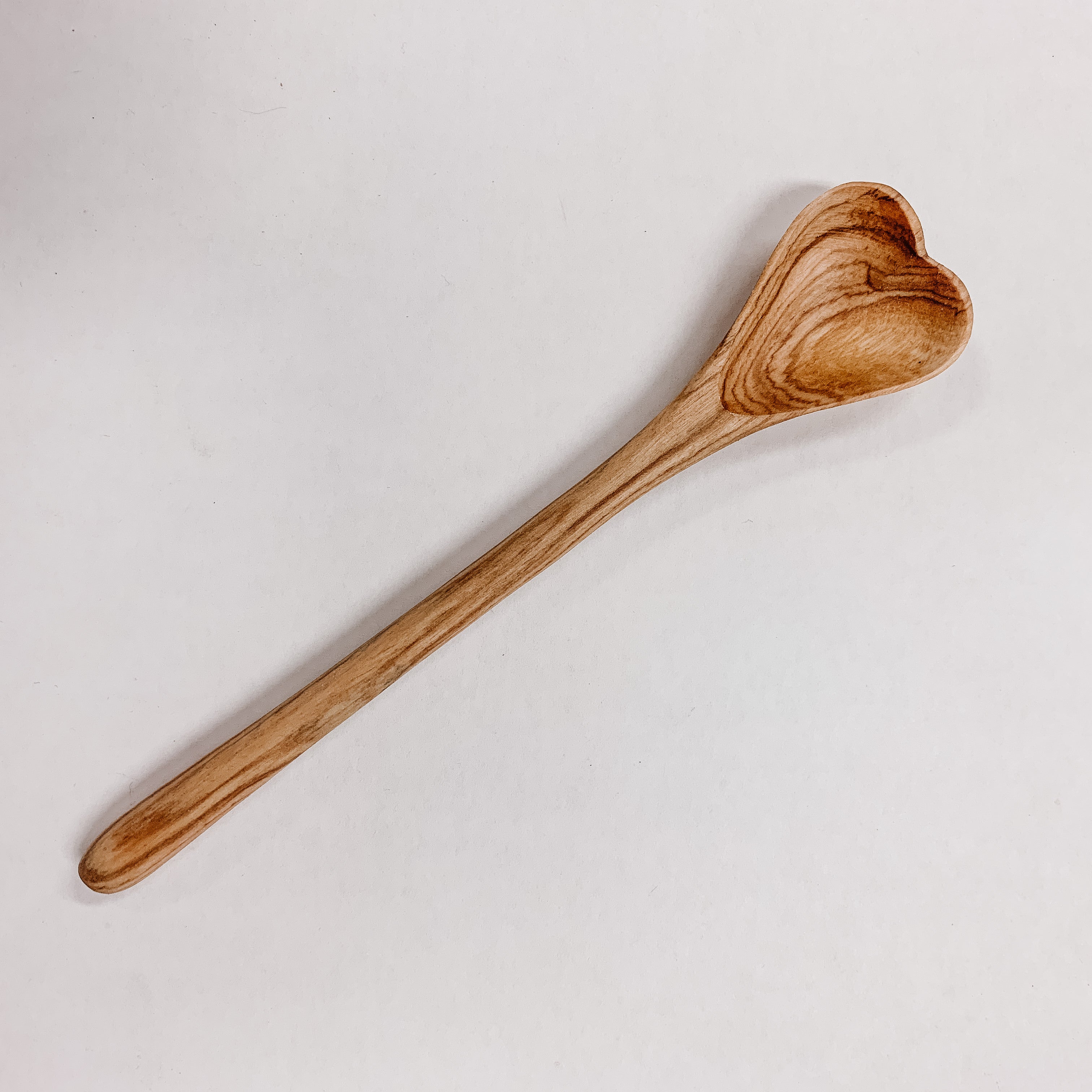 JustOne's tea spoon with the scoop in the shape of a heart, handcrafted in Kenya