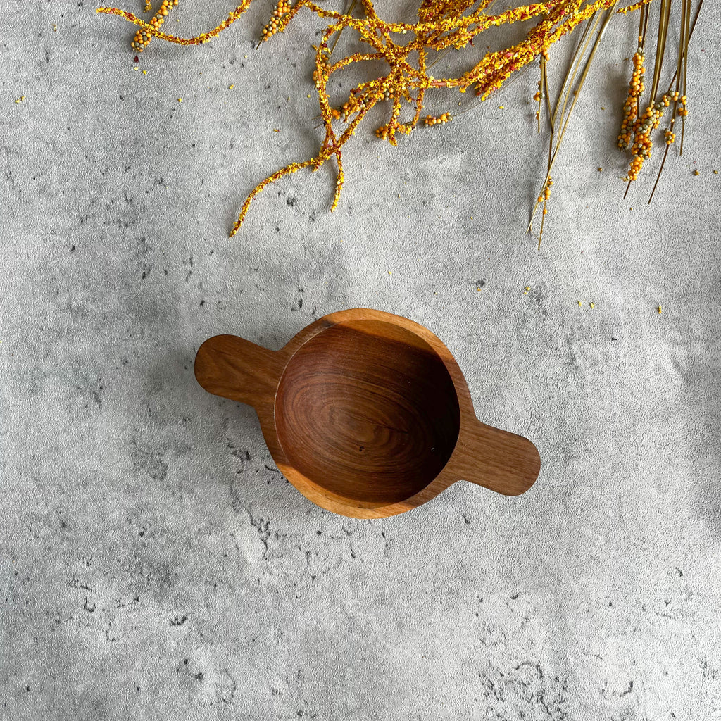 JustOne's small wooden bowl with two handles, handmade in Kenya