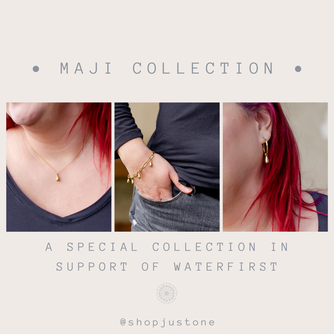 JustOne's maji collection with the brass chainlink bracelet with teardrop charms dangling off, handcrafted in Kenya