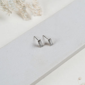JustOne's small, silver, bar studs made ethically from recycled materials in Kenya